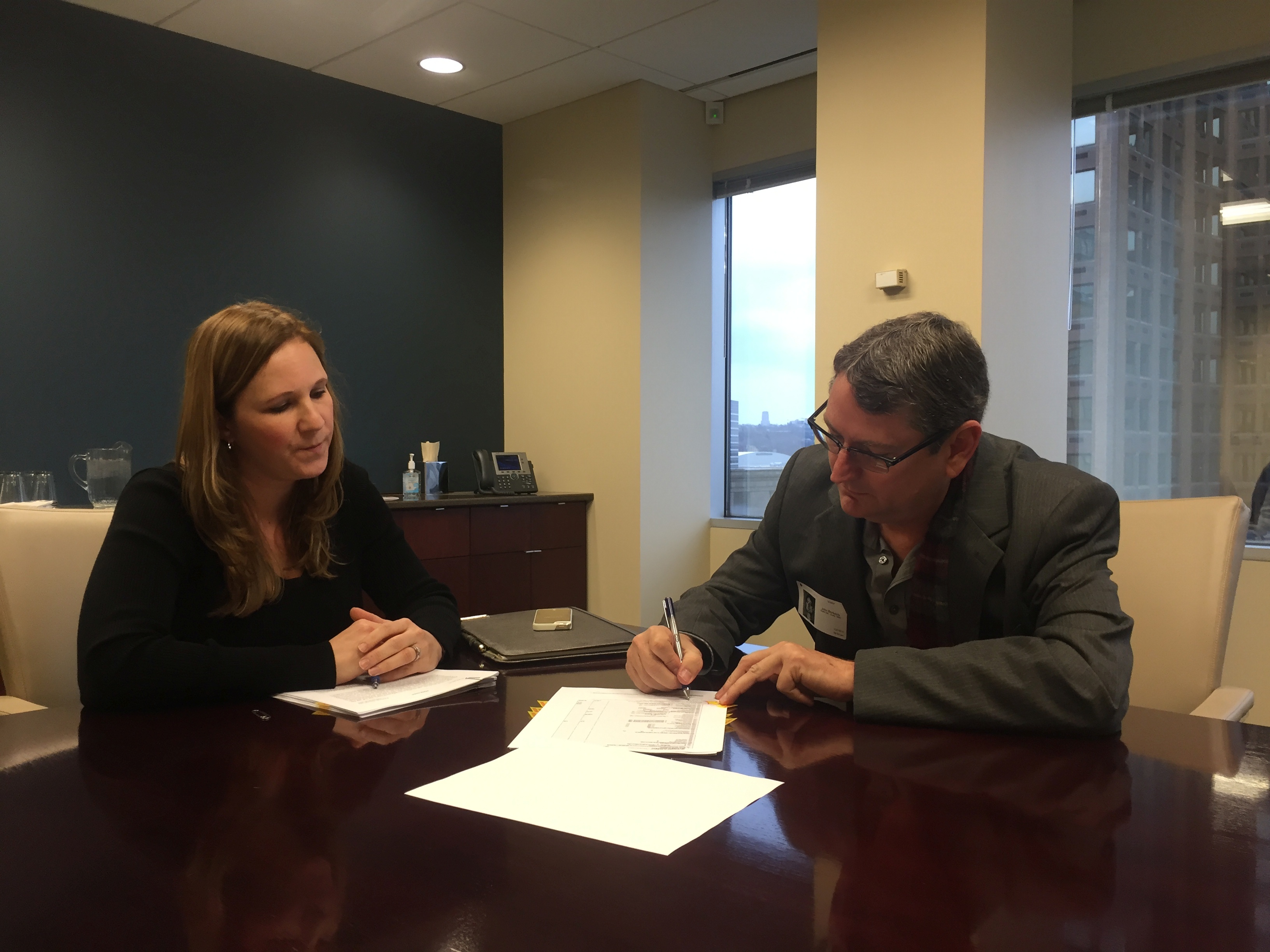 Johnny Bertucci signing the Act of Sale for The Ark and The Dove